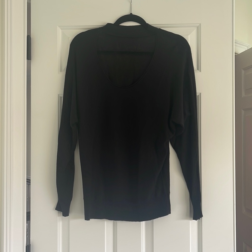 Splendid size small keyhole sweater. Can be worn in front or back.